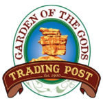 balanced rock formation and logo of the Garden of the Gods Trading Post